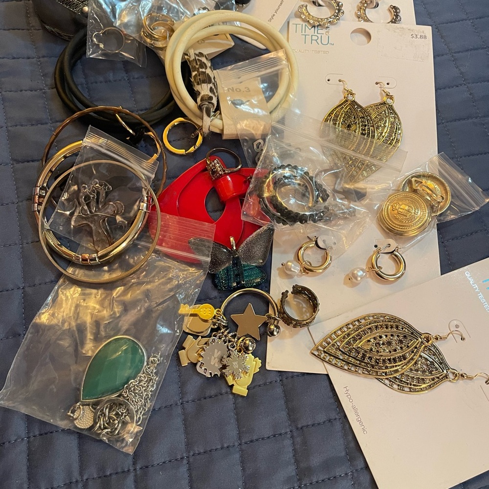 Miscellaneous bag of wearable jewelry.
